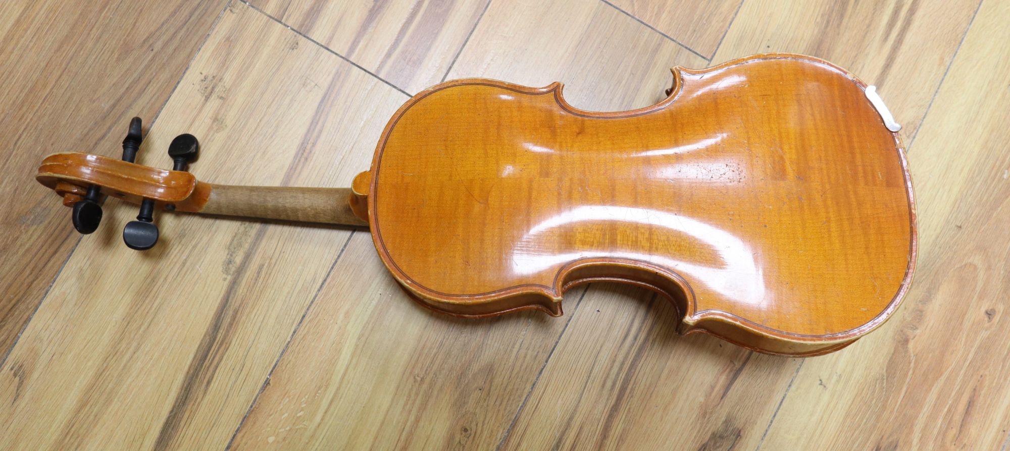 A 3/4 size violin, labelled Stradavarius, cased